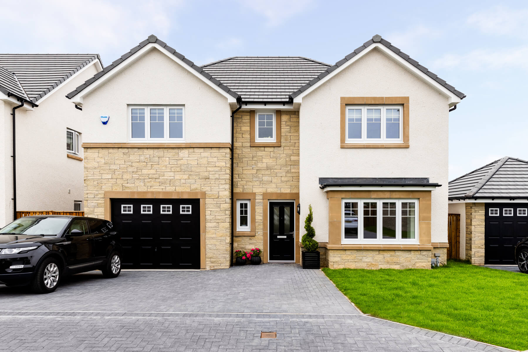 4 bedroom detached with garden room and integral garage - Image 1